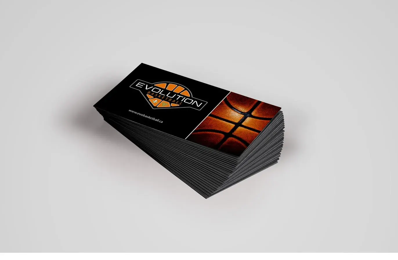 Stack of black business cards with the crest and a basketball close-up.