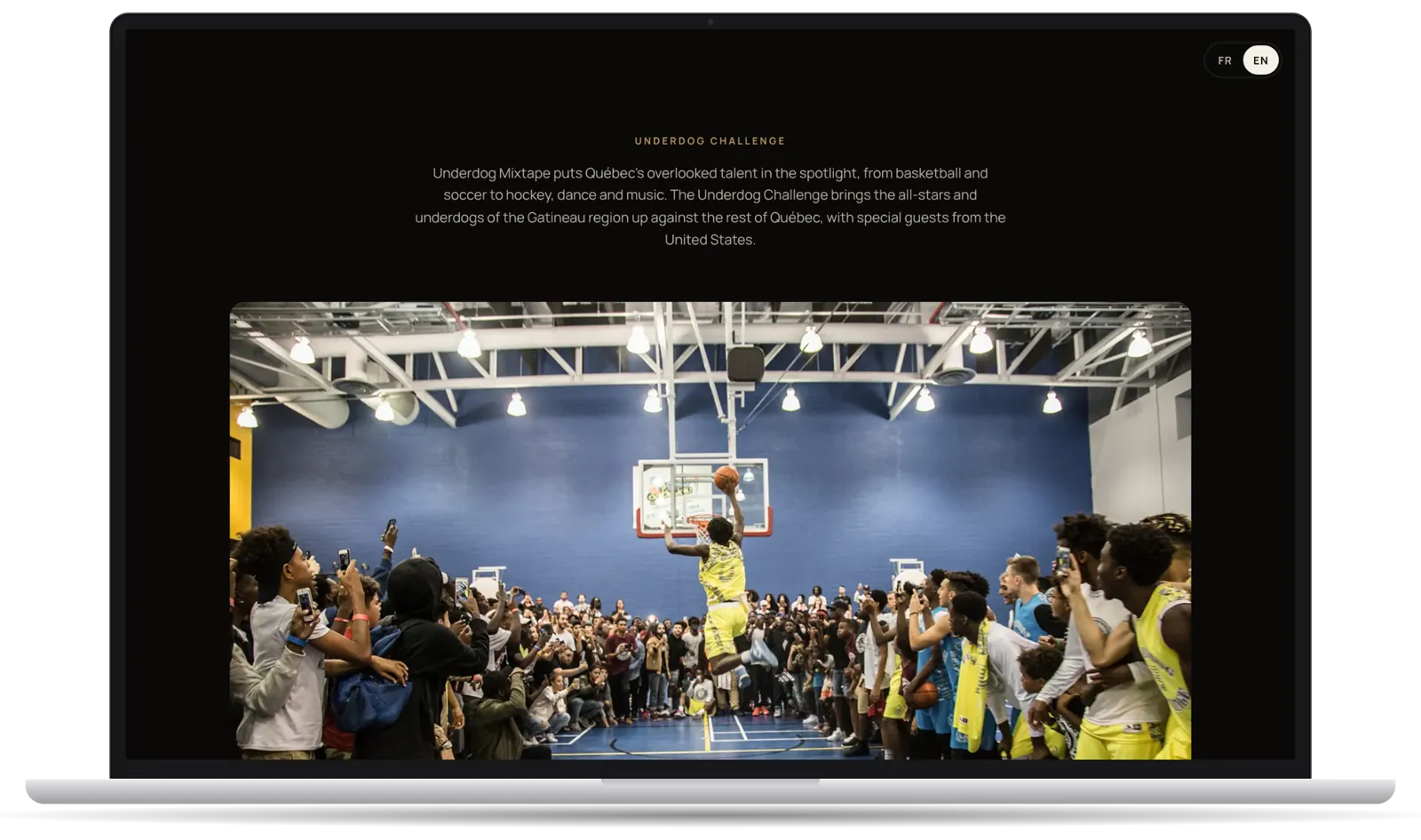 Laptop showing a slam dunk photo in the Underdog Challenge slideshow.